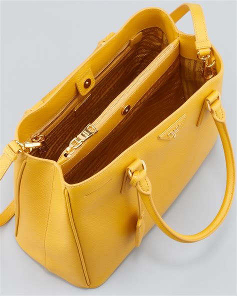 prada yellow handbag.